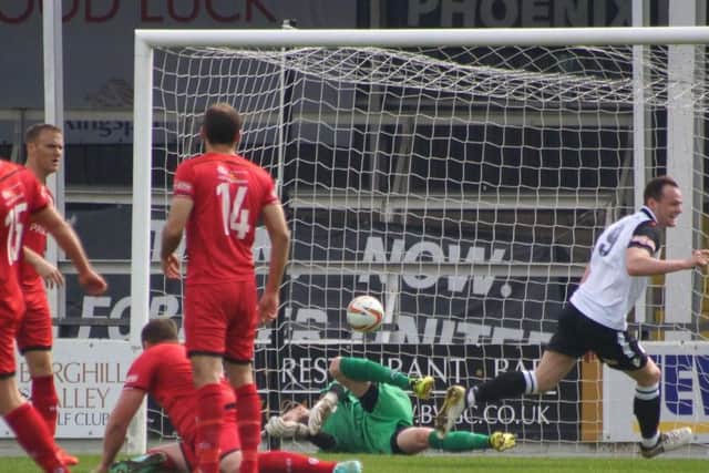 Hereford score one of their four goals as Kettering Town slipped to a 4-1 defeat at Edgar Street. Pictures by Peter Short