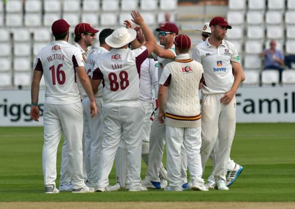 The Northants players celebrate a Warwickshire wicket at the County Ground on Saturday (PIctures; Dave Ikin)