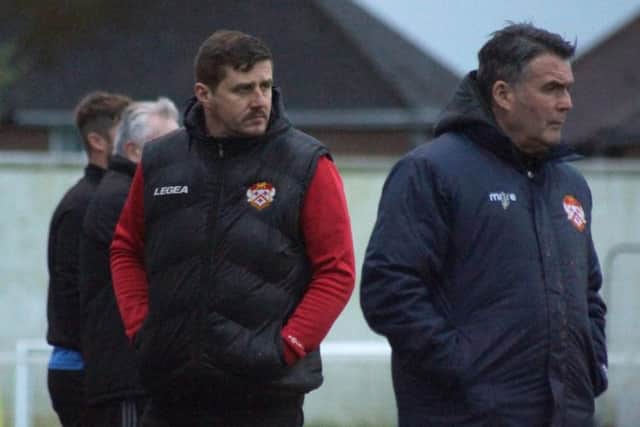 Marcus Law watches on during Kettering Town's 3-2 home defeat to Tiverton Town. Pictures by Peter Short