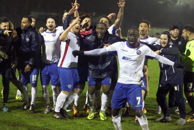 The AFC Rushden & Diamonds players celebrate promotion on the Hayden Road pitch after their 7-1 victory over Aylesbury FC on Tuesday night. Picture by Alison Bagley