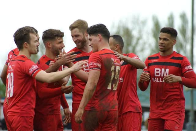 Mathew Stevens takes the congratulations after his third goal