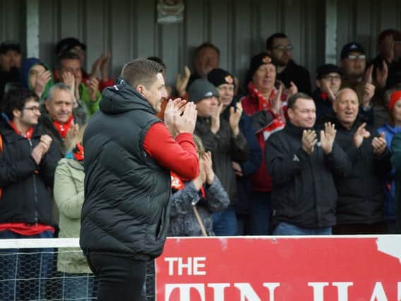 Marcus Law and the Kettering Town fans will be hoping their team can book a place in the Evo-Stik South League Premier play-off final when they head to Slough Town tonight. Picture by Peter Short
