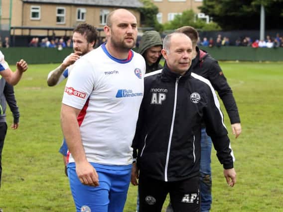 Captain Liam Dolman and boss Andy Peaks pictured following AFC Rushden & Diamonds' final game of their promotion-winning campaign. Picture by Alison Bagley