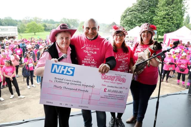 Glennis Hooper handing over a cheque for Â£30,000 to KGH