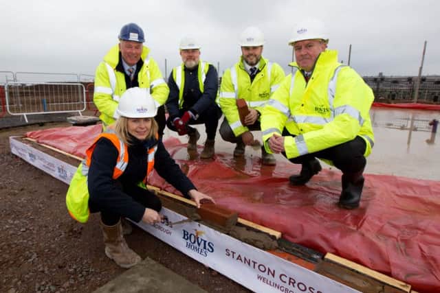 The laying of the first house brick at Stanton Cross in Wellingborough