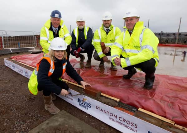 The laying of the first house brick at Stanton Cross in Wellingborough