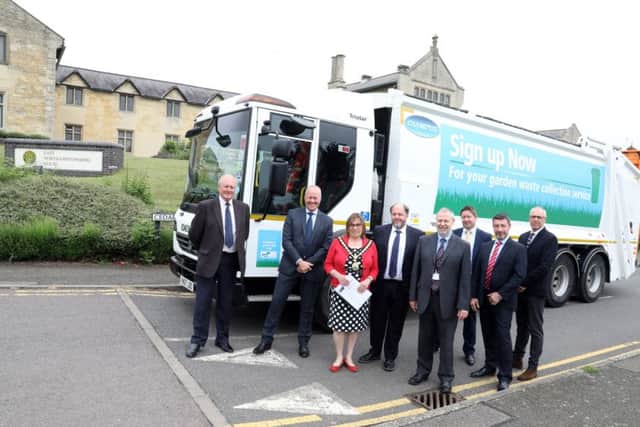 Members of East Northants Council and FCC Environment Ltd with one of the new vehicles