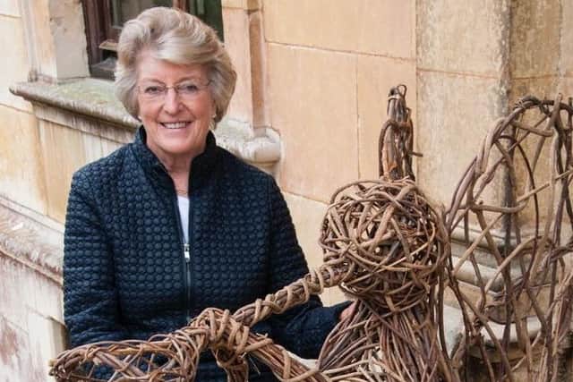 Lady Victoria Leatham with one of the wicker angels at Thorpe Hall
Photo: Tim Sandall EMN-160915-171636001