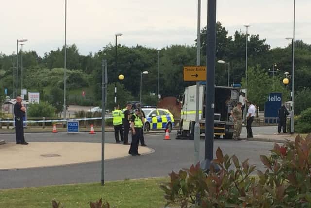 The bomb disposal team at the scene outside Tesco Extra in Corby