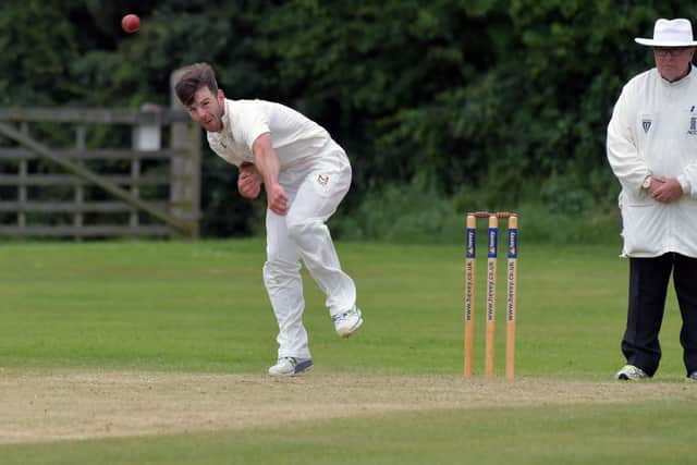 Jake Bindley sends down a delivery during Desboroughs win at East Haddon. Bindley went on to hit an unbeaten 153 to guide high-flying Desborough to a six-wicket victory in Division One. Picture by Dave Ikin