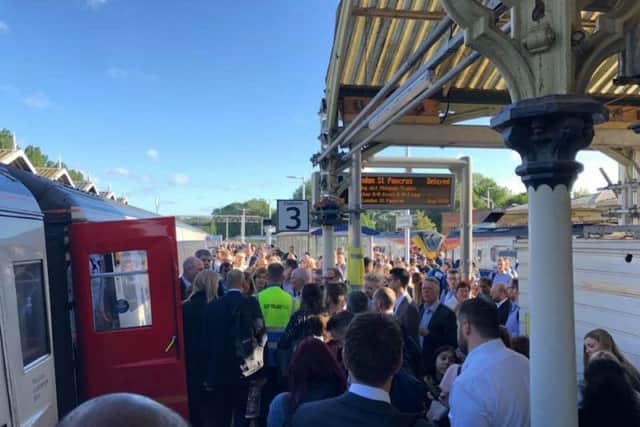 Chaos on the platform at Kettering Railway Station. Picture by Andy Sawford. NNL-180621-101700005