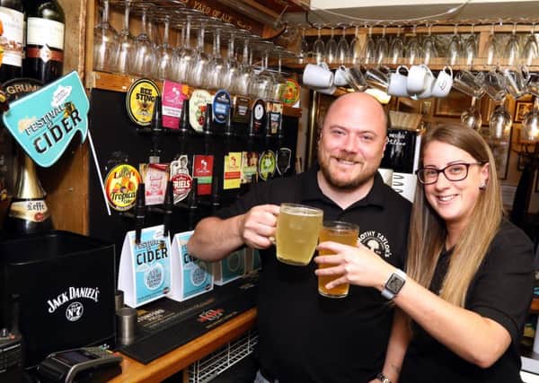 CAMRA Award: Wellingborough: Coach and Horses cider pub of the year 
Landlord John Eames with deputy manager, Lisa Perkins. 
Wednesday, June 20th 2018 NNL-180620-201925009