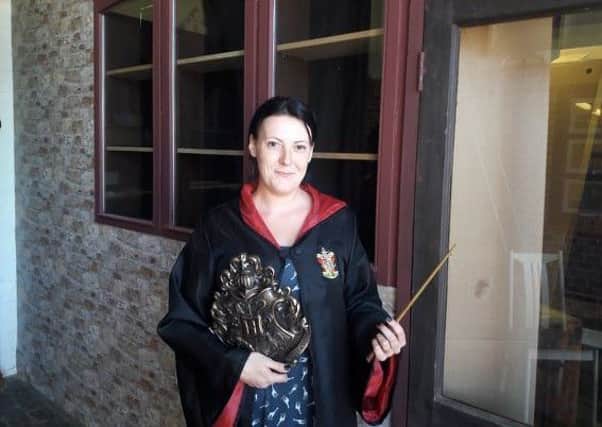 Chrissy Constable with some of the Harry Potter memorabilia.