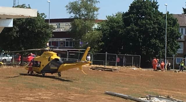 The air ambulance at the building site in Corby town centre. Picture by Kit Mallin. NNL-180628-114002005