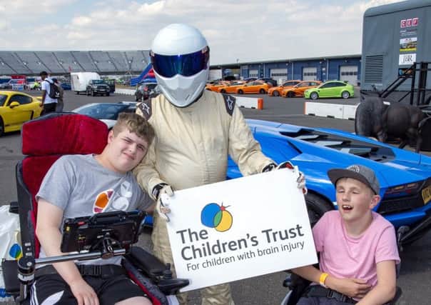 Mikey Wells (right) with The Stig