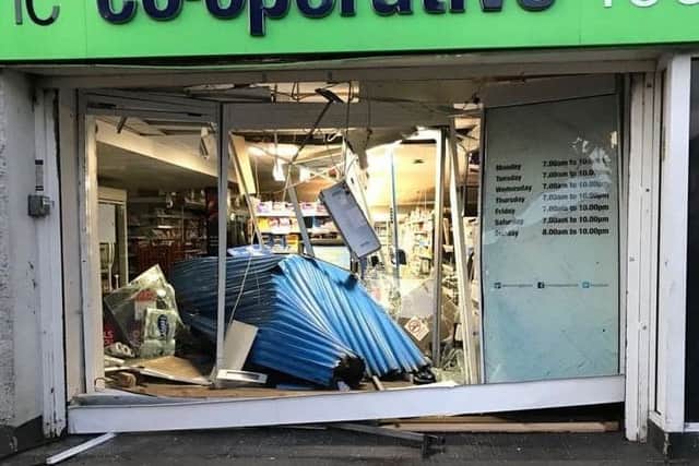 Damage caused after the first incident at the shop, a ram-raid, on Monday morning.