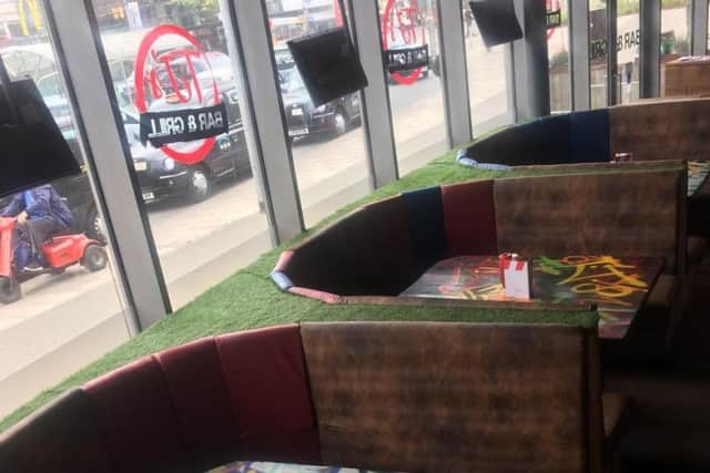 Cosy booths with incredible artwork at the newly-rebranded TJ's