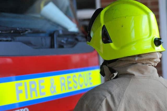 Firefighters are tackling a field fire in Raunds