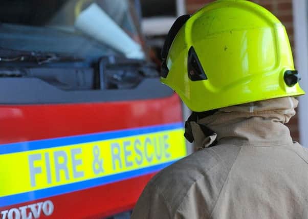 Firefighters are tackling a field fire in Raunds