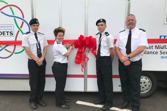The ribbon cutting for the new vehicle
