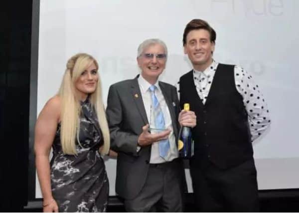 Paul Balmer (middle), from Corby, the winner of the Unsung Hero category in 2017