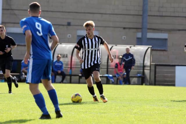 Ben Bradshaw scored twice in the second half as Corby Town beat Dunstable Town 4-0 in the preliminary round replay