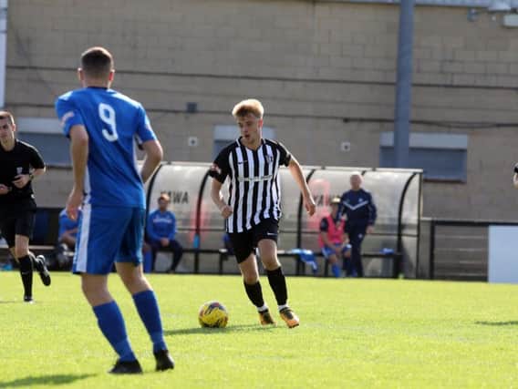 Ben Bradshaw scored twice in the second half as Corby Town beat Dunstable Town 4-0 in the preliminary round replay