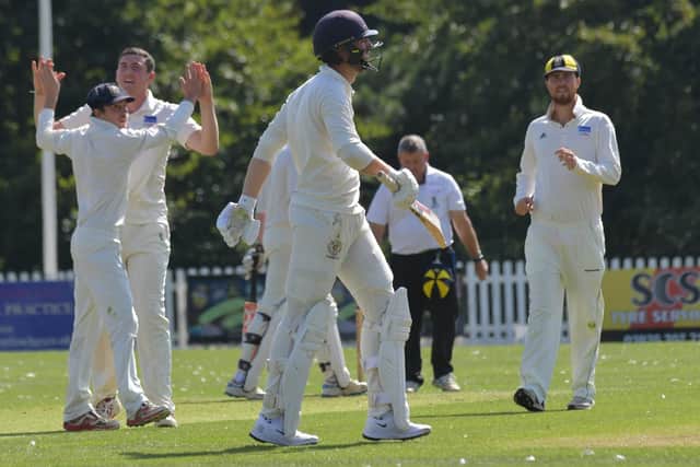 Finedon Dolben celebrate after Jack Chopping trapped Brixworths John Bowers leg before during the Premier Division leaders six-wicket victory last weekend. Picture by Dave Ikin