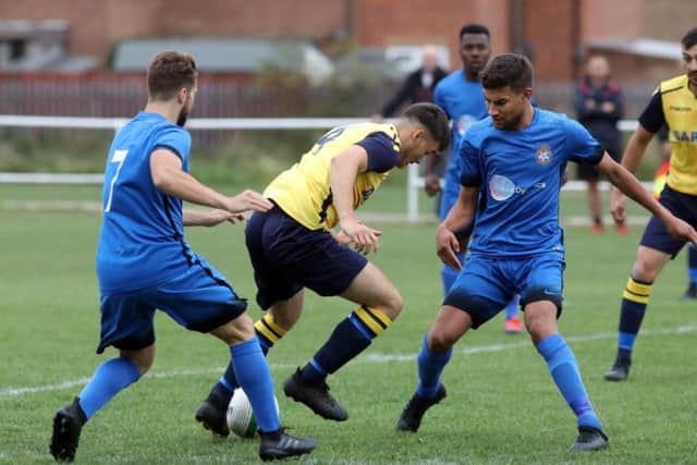 Action from the 2-2 draw between Desborough Town and Whitworth. Pictures by Alison Bagley