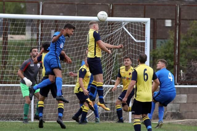 Honours were even in the derby clash between Desborough and Whitworth