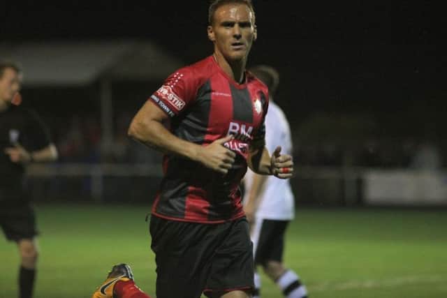 Brett Solkhon scored his 100th and 101st goals for Kettering Town as they beat Romford 4-1 in the first qualifying round of the Emirates FA Cup