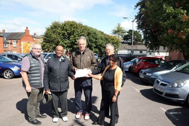 Cllr Jon Ekins and campaigners who want to save the car park presenting their petition to Peter Bone MP