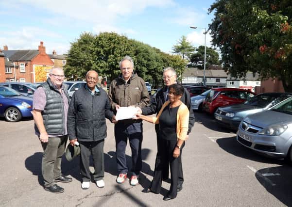 Cllr Jon Ekins and campaigners who want to save the car park presenting their petition to Peter Bone MP