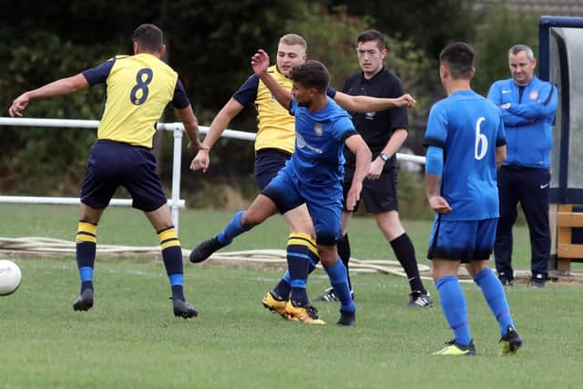 Action from the 2-2 draw between Desborough Town and Whitworth in the UCL Premier Division last weekend. Ar Tarn are on home soil again this Saturday as they take on Newport Pagnell Town. Picture by Alison Bagley