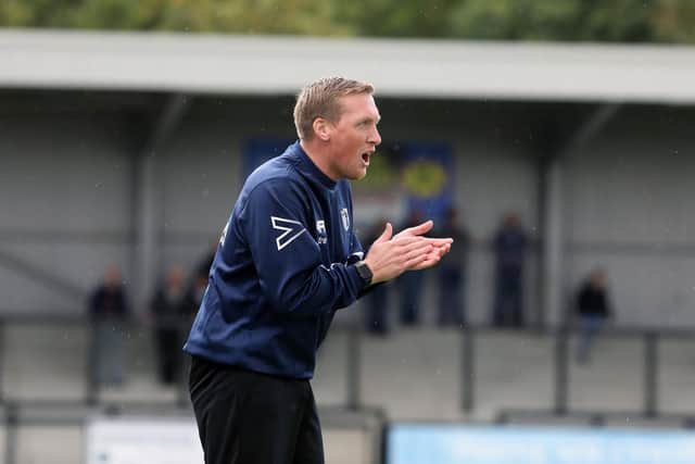 Assistant-manager Ashley Robinson was understandably delighted after he watched Corby Town run riot with an 8-1 victory at North Leigh