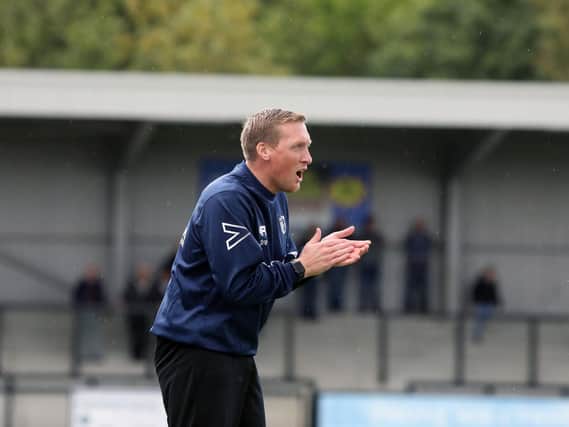 Assistant-manager Ashley Robinson was understandably delighted after he watched Corby Town run riot with an 8-1 victory at North Leigh
