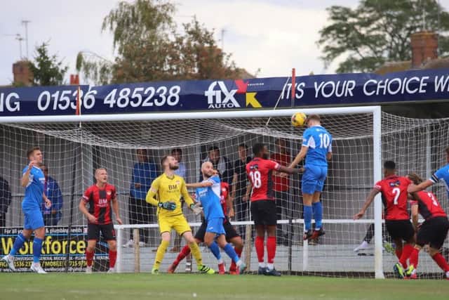 Dominic Docherty rises unmarked at the far post to head home Leiston's opener as they inflicted a first defeat of the season on Kettering Town at Latimer Park. Pictures by Peter Short