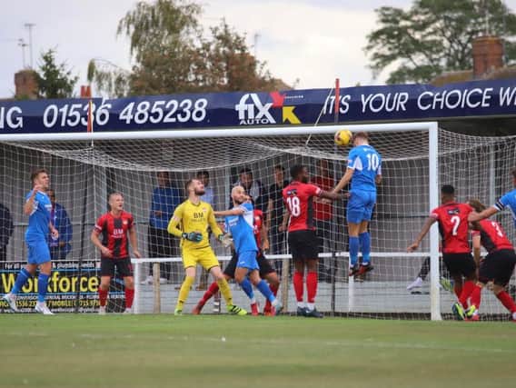 Dominic Docherty rises unmarked at the far post to head home Leiston's opener as they inflicted a first defeat of the season on Kettering Town at Latimer Park. Pictures by Peter Short