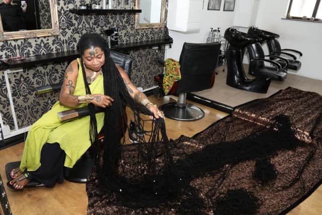 Asha Mandela showing off her dreadlocks