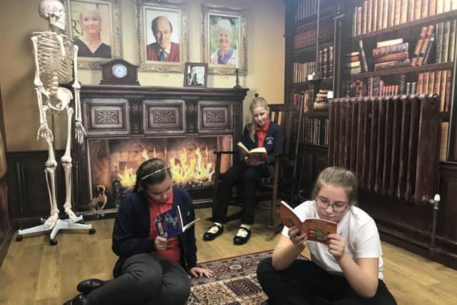 Children can sit by the 'fire' to read their favourite stories in the new Grange Primary Academy library NNL-180920-113057005