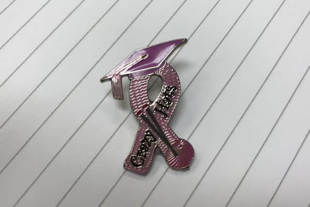 The new Crazy Hats pin badge