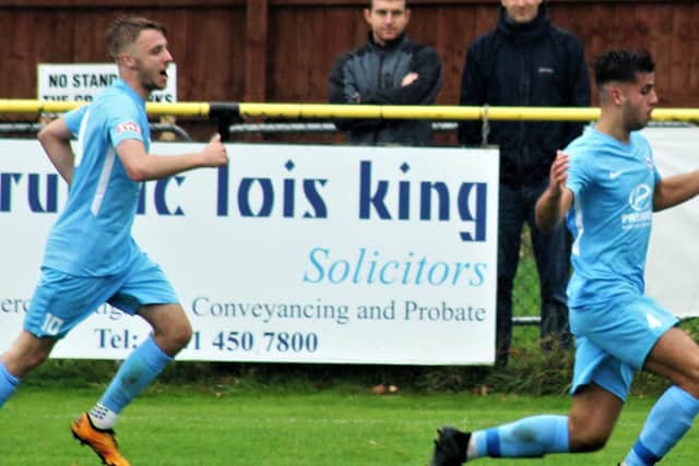 Joel Carta celebrates one of his three goals in Corby Town's FA Cup win at Alvechurch last weekend. Picture by David Tilley