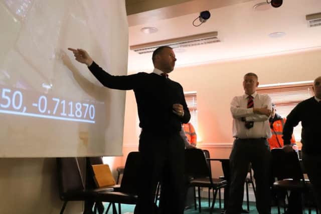 Kettering Town owner Ritchie Jeune broke the news of the clubs purchase of an area of land in the town to a packed fans forum at Latimer Park. Picture by Peter Short
