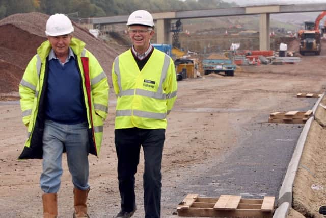 Then county council leader Jim Harker (right) with Cllr Stan Heggs during the construction of the link road.