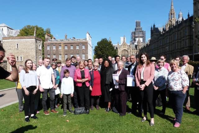 Campaigners who went to lobby Westminster, including Elliott and his dad Nick, with Beth Miller NNL-180928-144458005