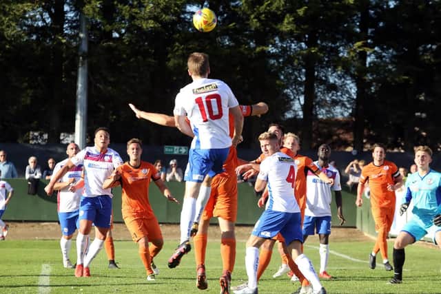 Jack Bowen gets up to head towards goal during AFC Rushden & Diamonds' 0-0 draw with St Ives Town. Pictures by Alison Bagley