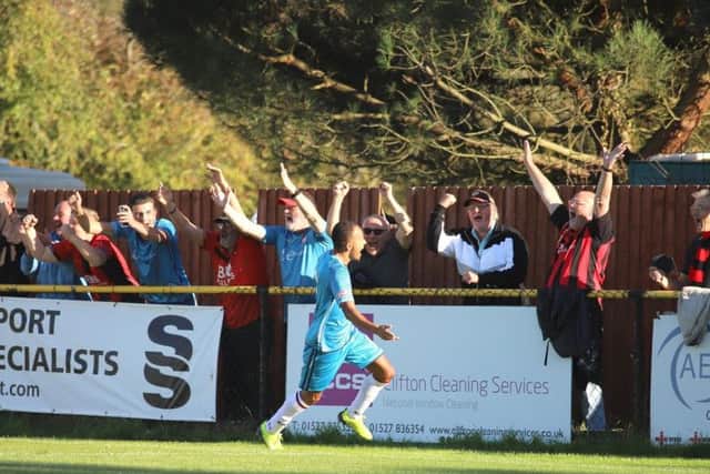 Rhys Hoenes celebrates his second goal in Kettering Town's 3-1 success at Alvechurch. Pictures by Peter Short