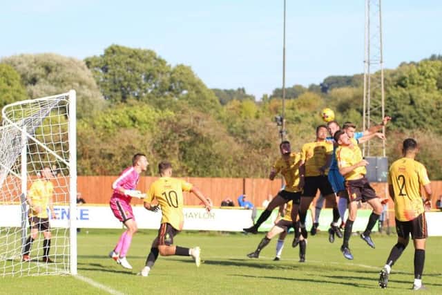 Declan Towers heads home the Poppies' second goal