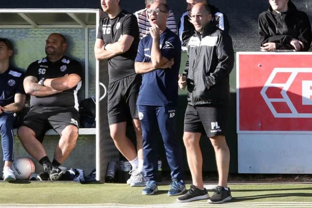 Boss Andy Peaks shouts out some instructions from the touchline during the 0-0 draw