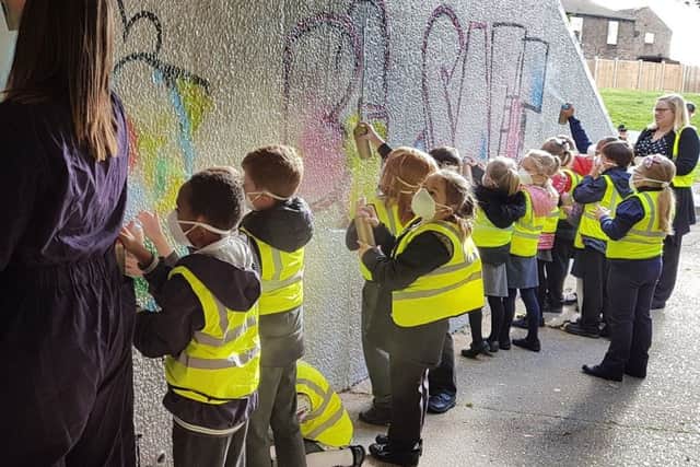 Pupils from Ruskin Academy working on the underpass